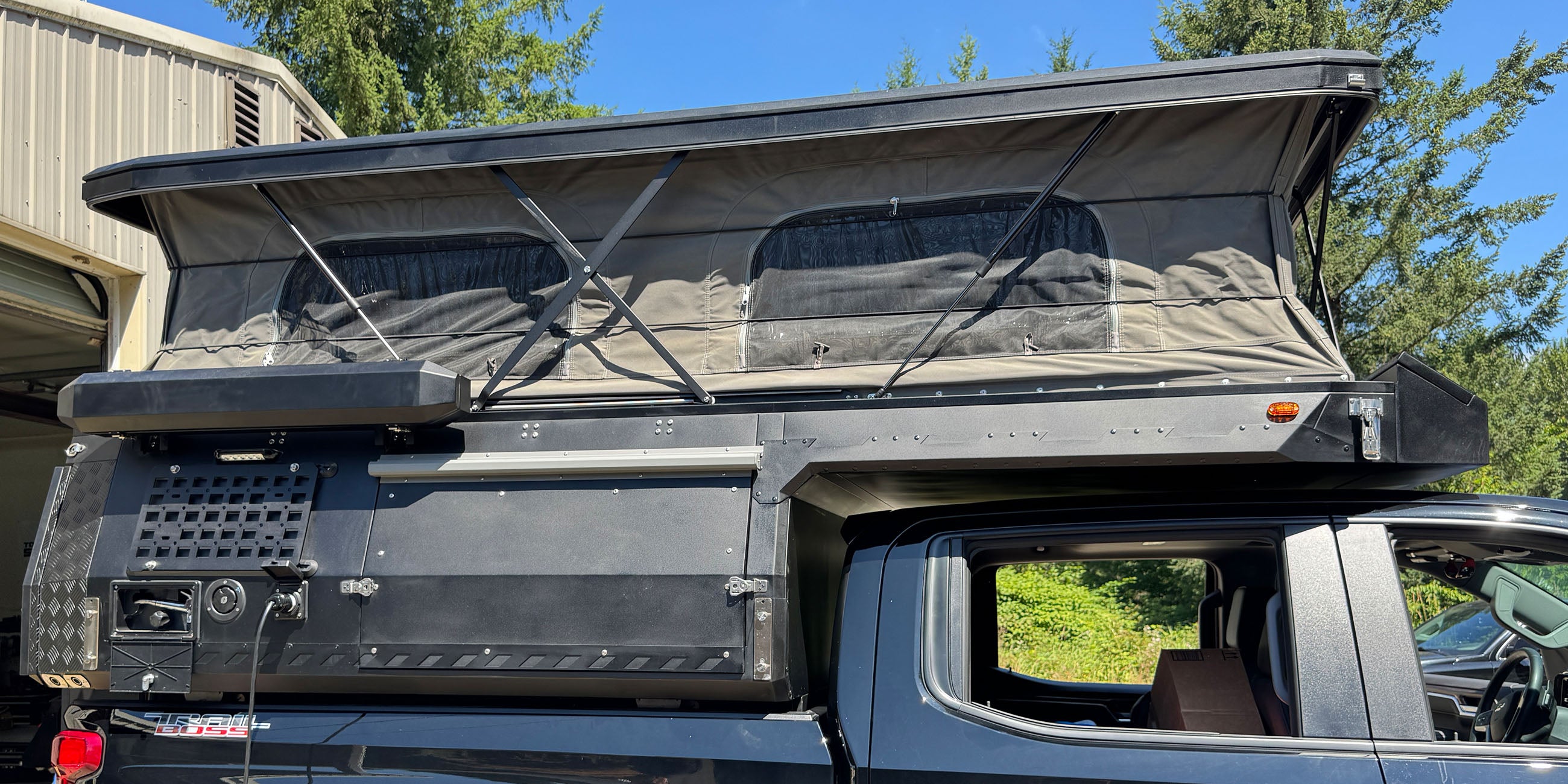 Apex camper set up at camp