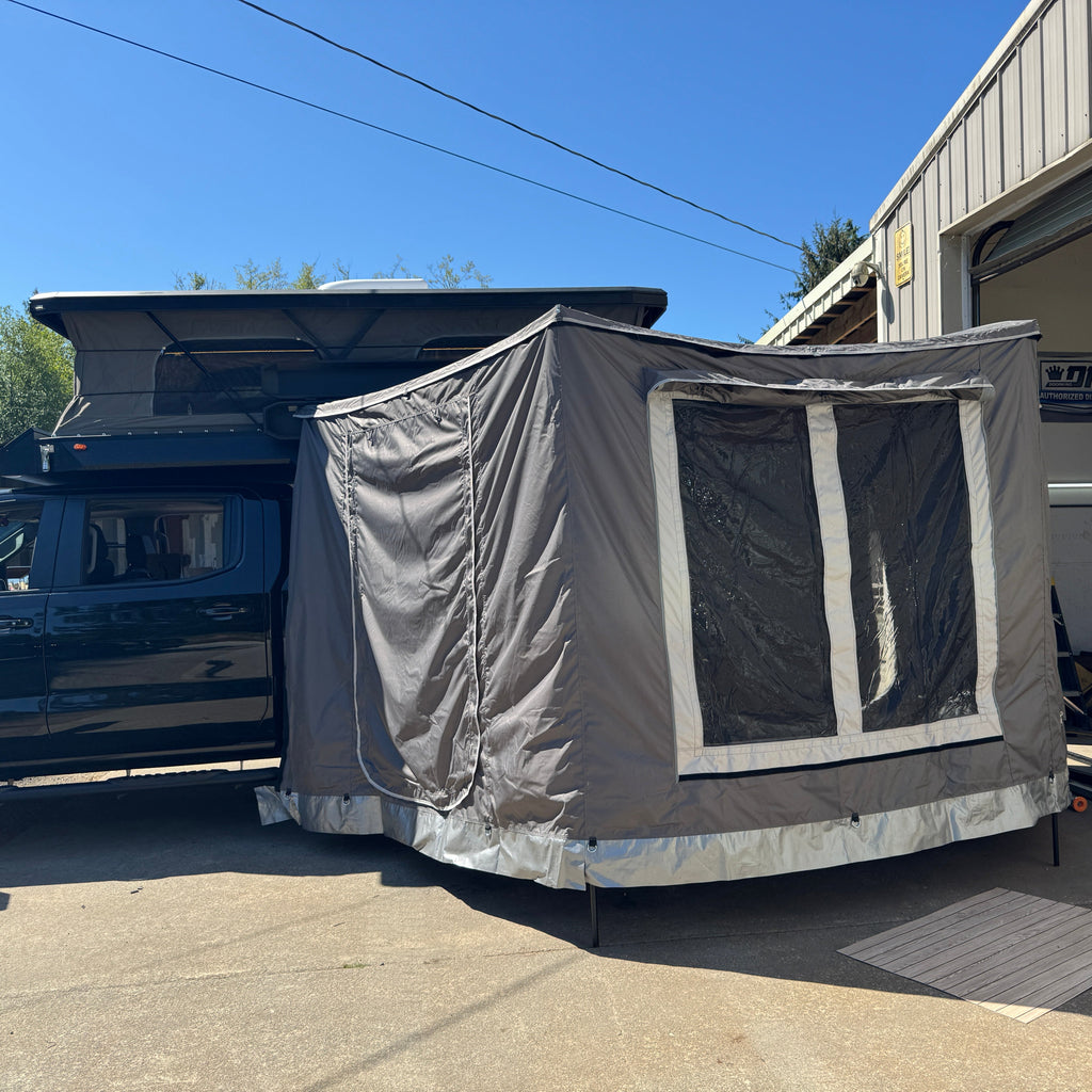 cascadia overland co apex camper with awning and annex room open 